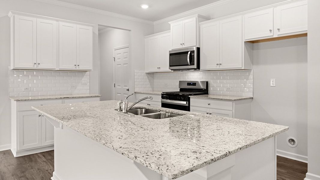 Representative furnished interior of a home built from the Belfort by D.R. Horton in Parkside at Carter Grove, Cartersville (Image 7).