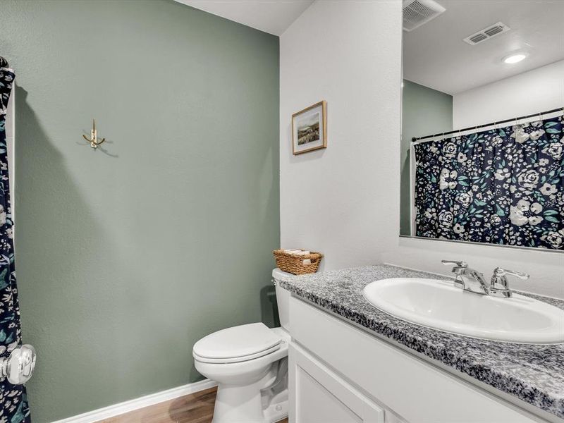 Full bathroom between secondary bathrooms Full bathroom between secondary bathrooms