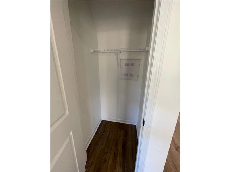 This organized closet space features durable wood