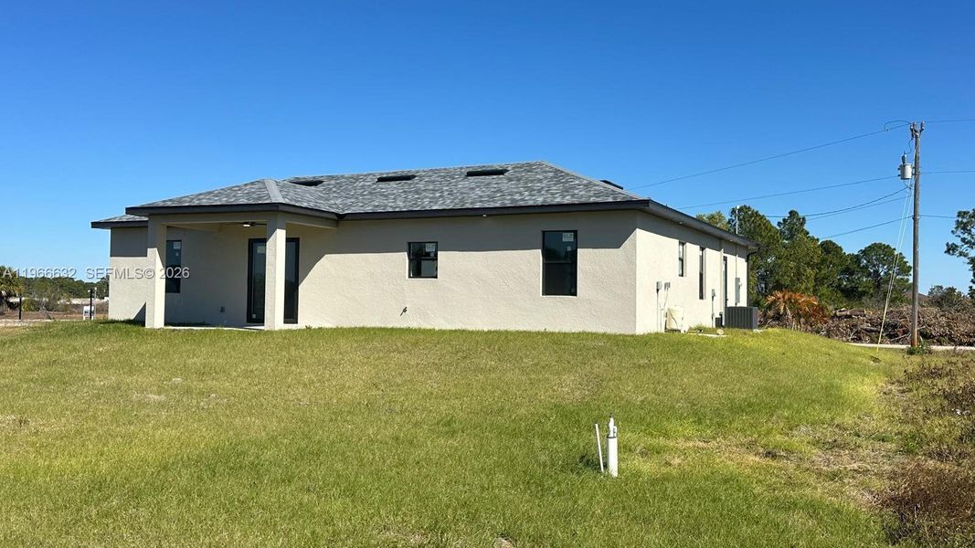 Exterior details and patio area of a home in , Lehigh Acres (Image 24).