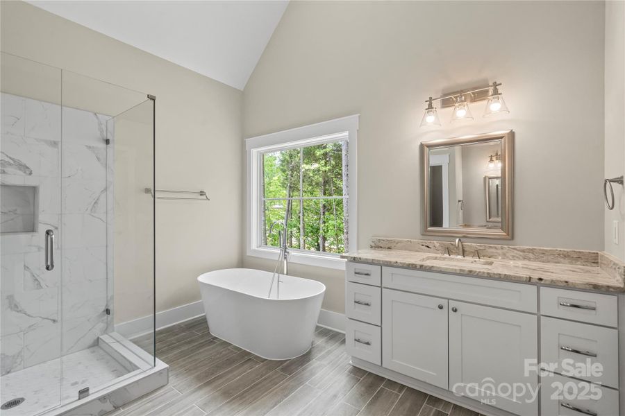 Stunning master bathroom with tile shower & deep soaking tub Stunning master bathroom with tile shower & deep soaking tub