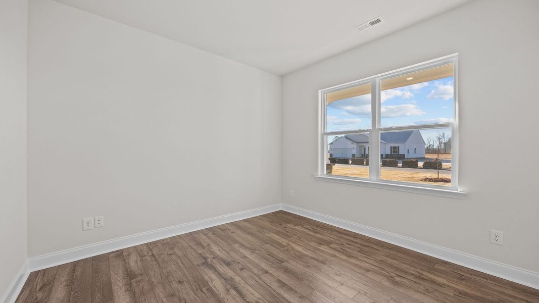 Spacious, unfurnished interior of a new home in Beaver Dam Crossing, Bailey (Image 15). Spacious, unfurnished interior of a new home in Beaver Dam Crossing, Bailey (Image 15).