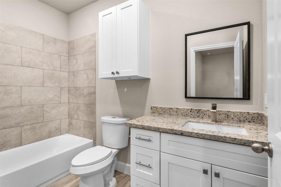 Furnished interior view inside a new home in , Willis (Image 11).