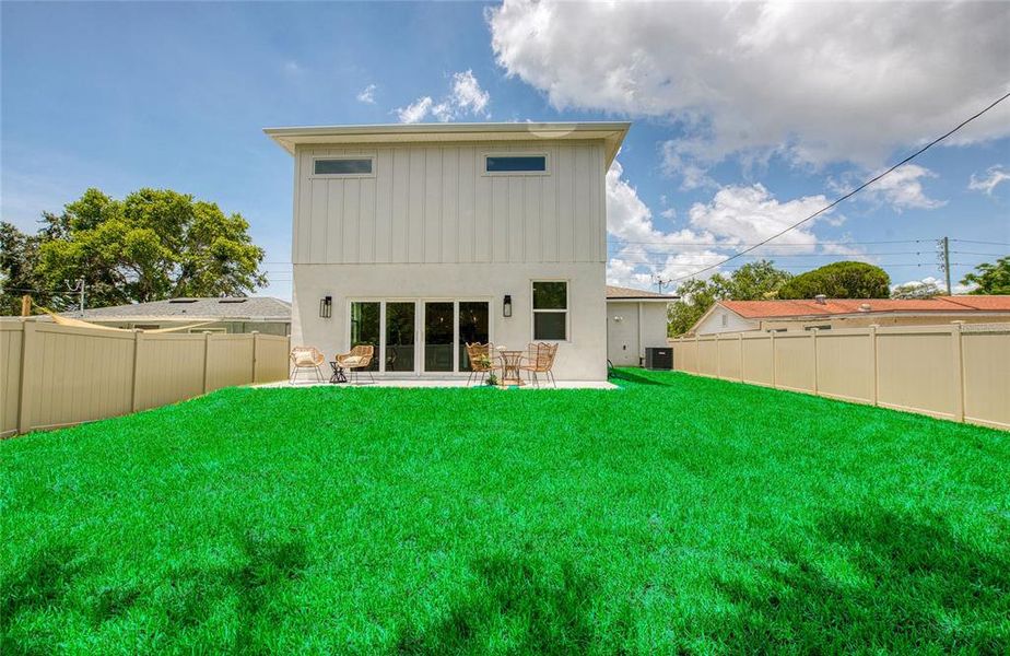 Exterior details and patio area of a home in , Palm Harbor (Image 3).