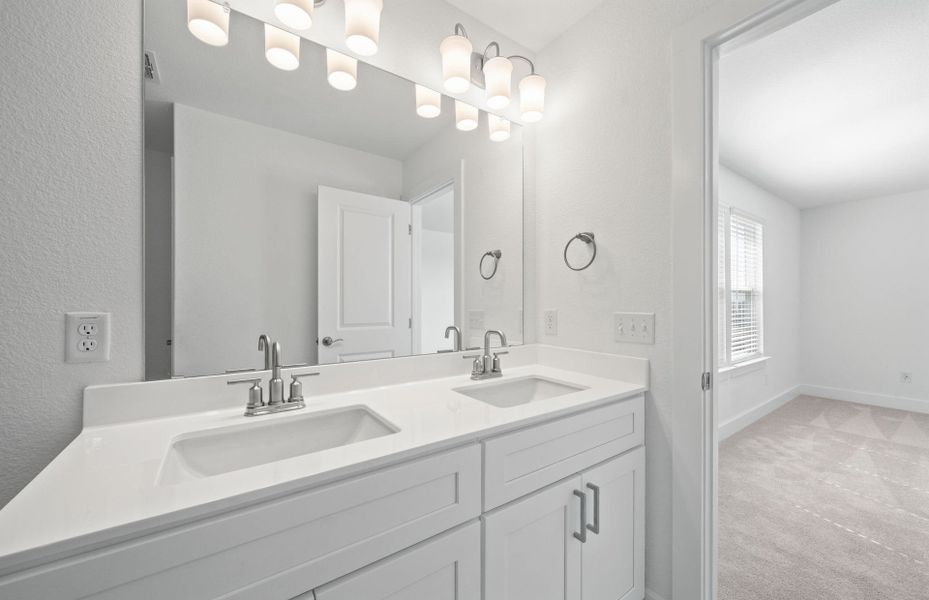 Furnished interior view inside a new home in Crosswinds, Kyle (Image 9).