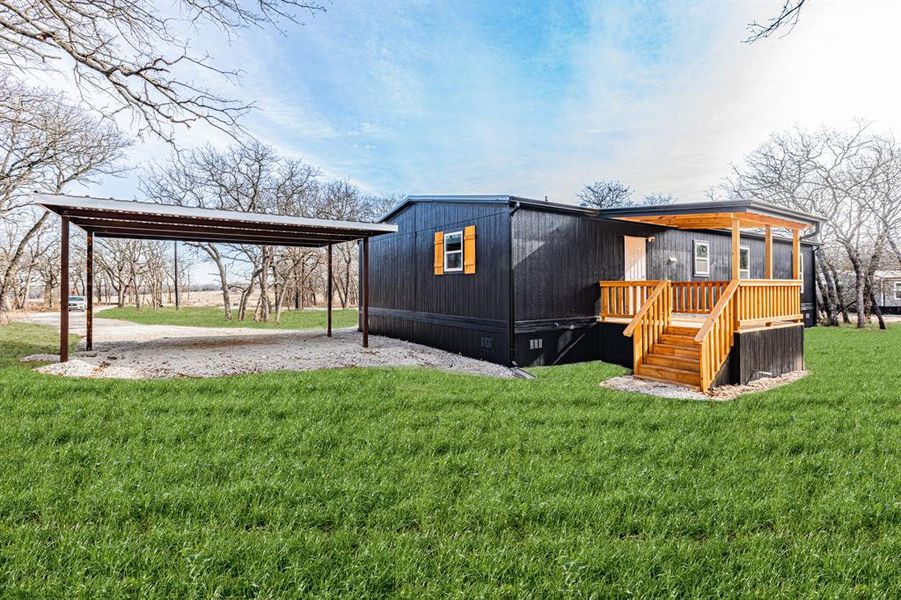 Exterior details and patio area of a home in , Sunset (Image 1). Exterior details and patio area of a home in , Sunset (Image 1).