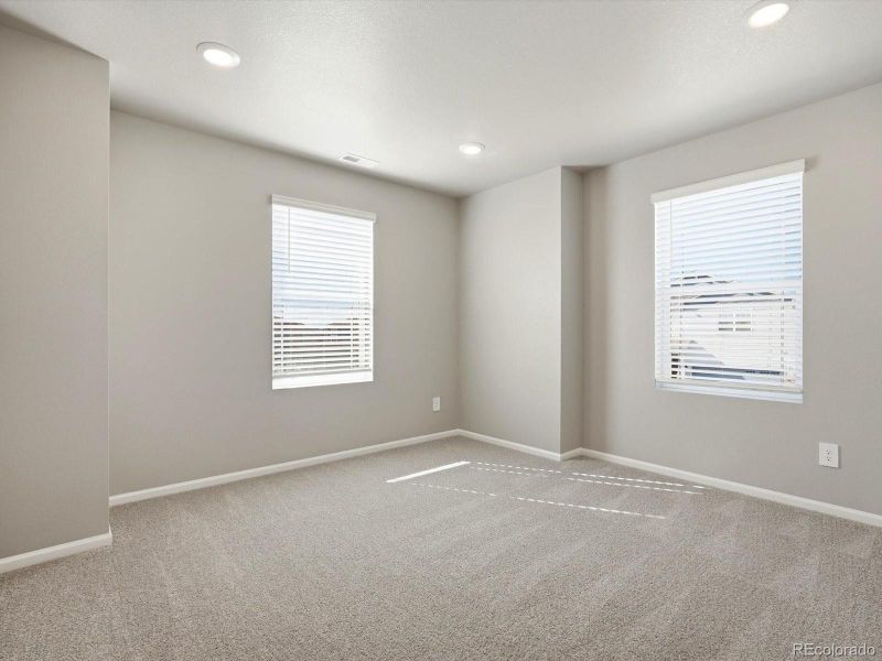 Spacious, unfurnished interior of a new home in Buffalo Highlands: The Flora Collection, Commerce City (Image 26).