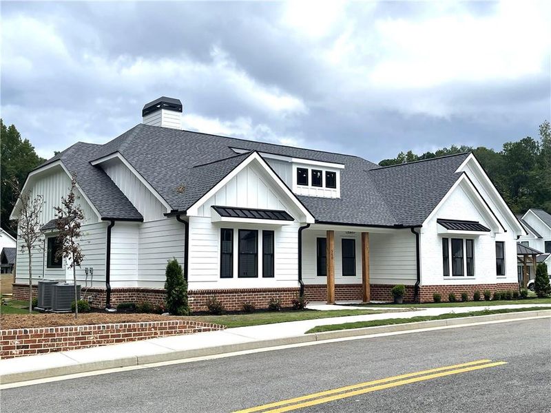 Front exterior of a new home in , Monroe, GA, highlighting curb appeal (Image 21).