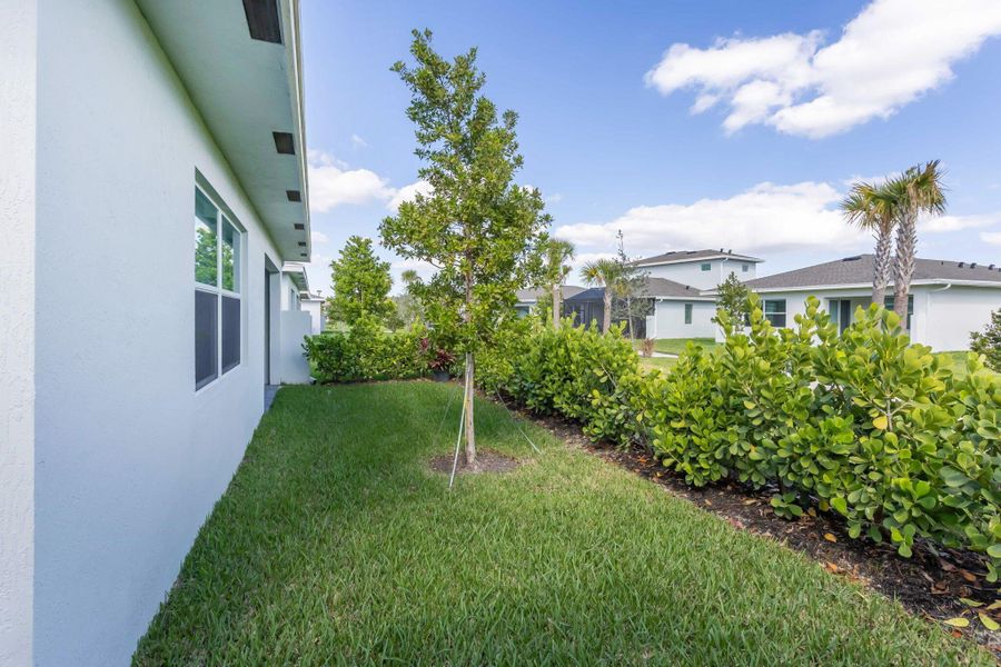Exterior details and patio area of a home in Delray Trails: The Woods, Delray Beach (Image 3).