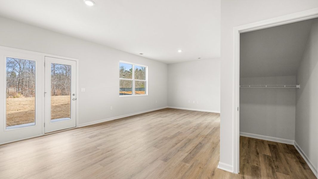 Representative unfurnished interior of a home built from the Penwell by D.R. Horton in Oakleigh Glen, Dallas (Image 12).
