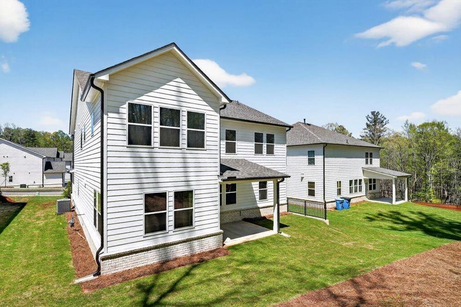 Exterior details and patio area of a home in Bailey Fence, Dacula (Image 4).