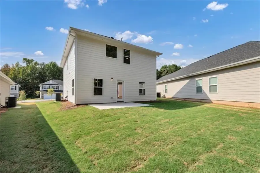 Exterior details and patio area of a home in Canterbury Villas, Carrollton (Image 22).