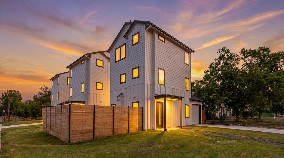 Clean architectural lines, contemporary finishes, and a distinctive three-story design create a striking first impression.