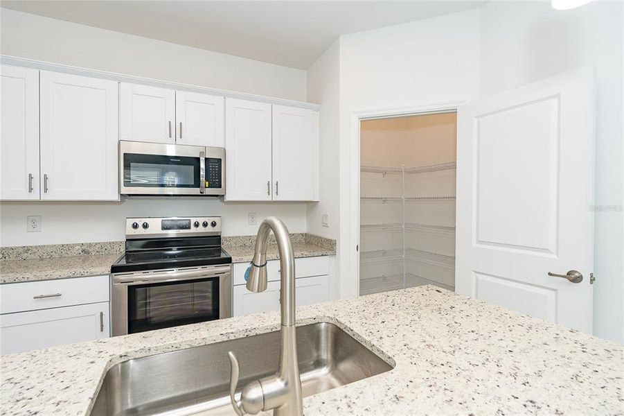 Furnished interior view inside a new home in , Port Charlotte (Image 11).