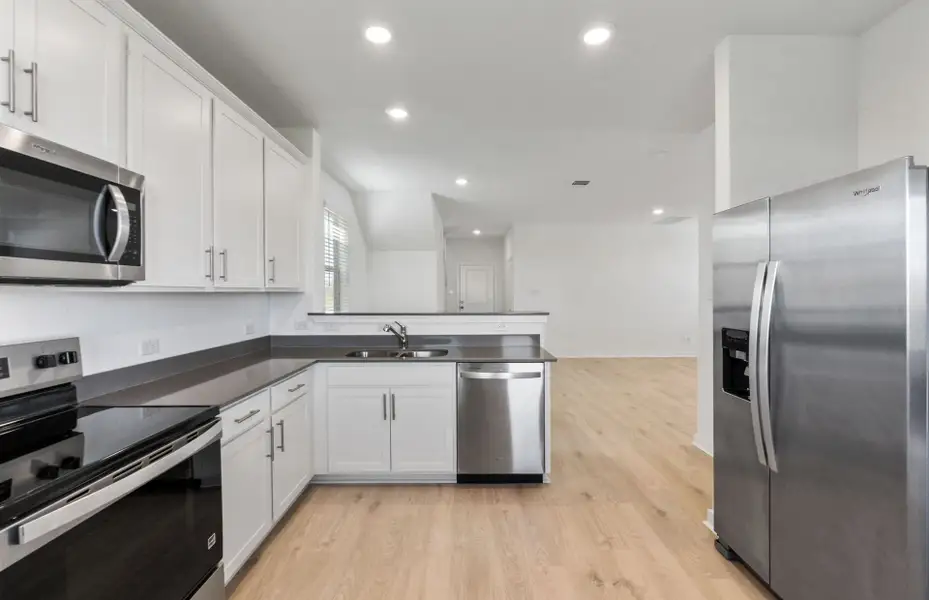 Furnished interior view inside a new home in Sonterra, Jarrell (Image 3).
