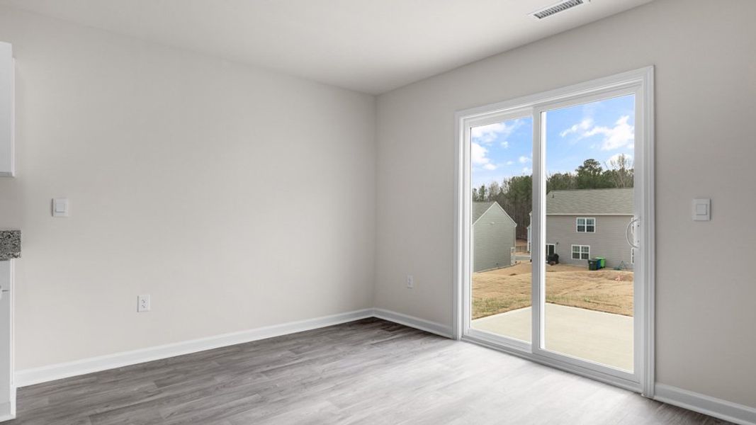 Representative unfurnished interior of a home built from the HAYDEN by D.R. Horton in Wilson's Ridge, Wilson's Mills (Image 34).