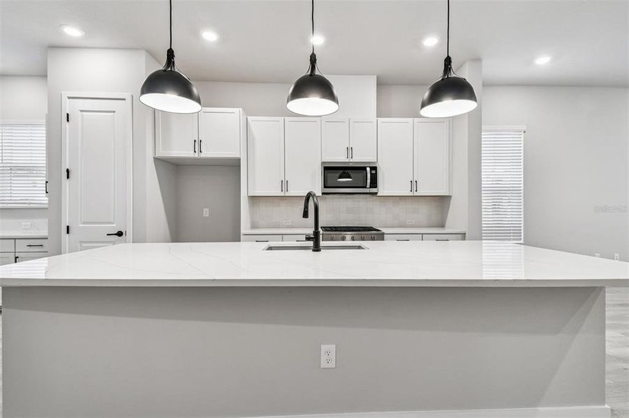 Furnished interior view inside a new home in Towns at Union, St. Petersburg (Image 10).