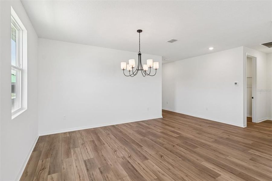 Spacious, unfurnished interior of a new home in Ardisia Park, New Smyrna Beach (Image 27).