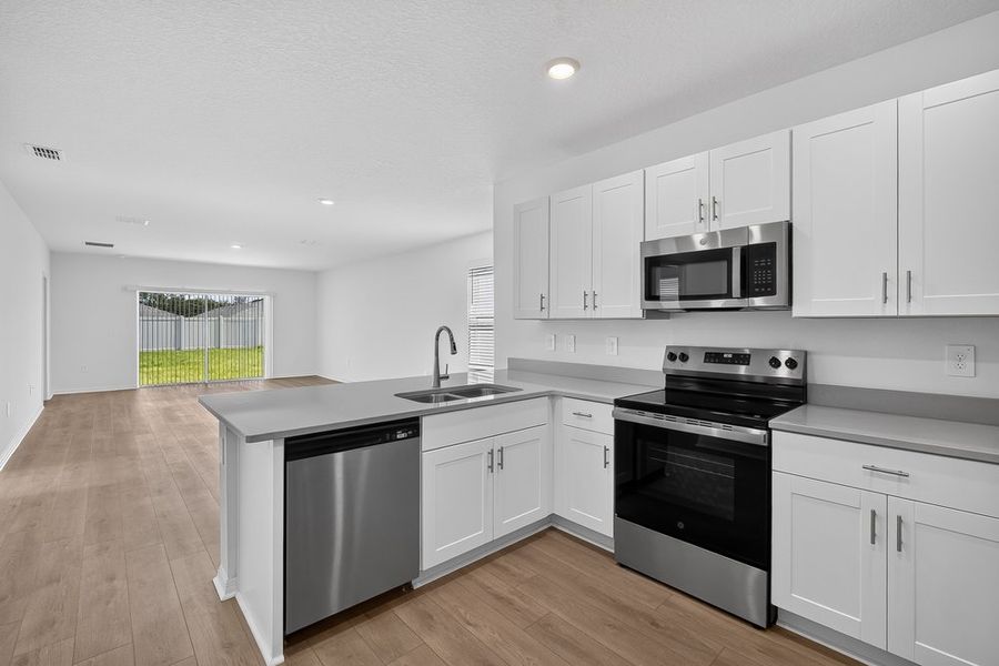 Furnished interior view inside a new home in Palm Wind, Hudson (Image 5).