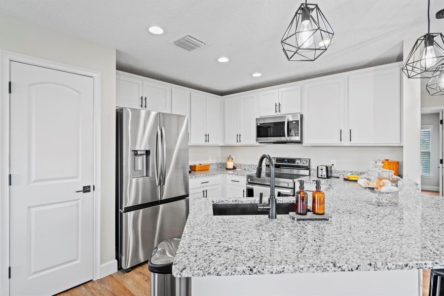 Furnished interior view inside a new home in , Okeechobee (Image 17).