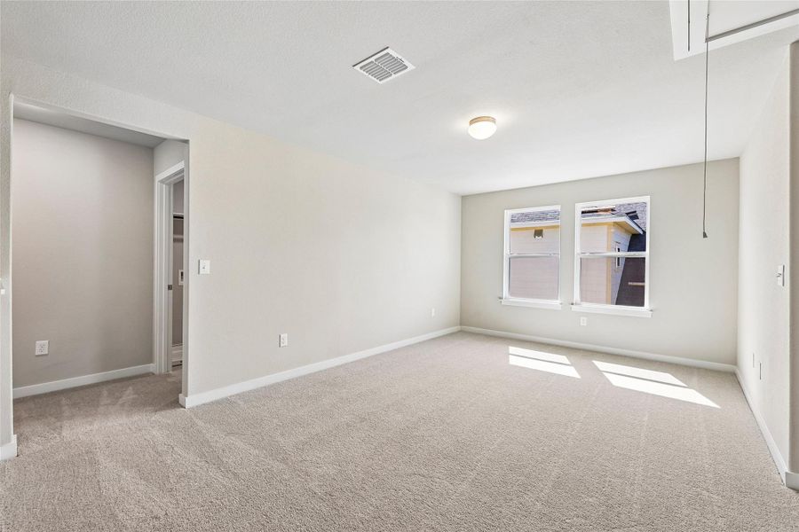 Spacious, unfurnished interior of a new home in Cascades at Onion Creek, Austin (Image 13).