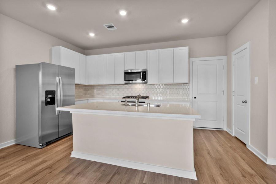 Furnished interior view inside a new home in Laurel Landing 40', Alvin (Image 6).