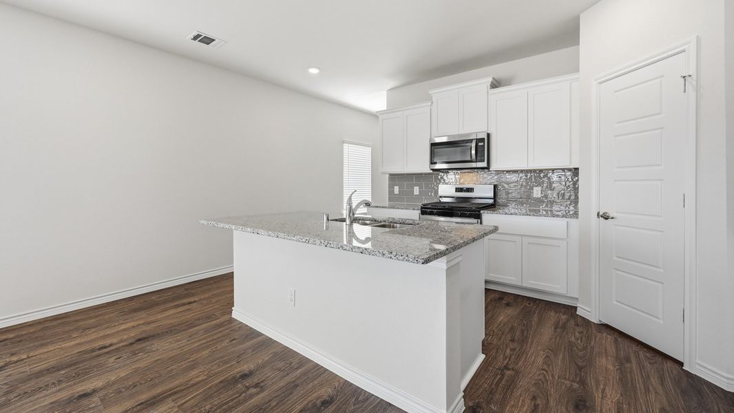 Representative furnished interior of a home built from the Sage by D.R. Horton in Windchime, Celina (Image 5).