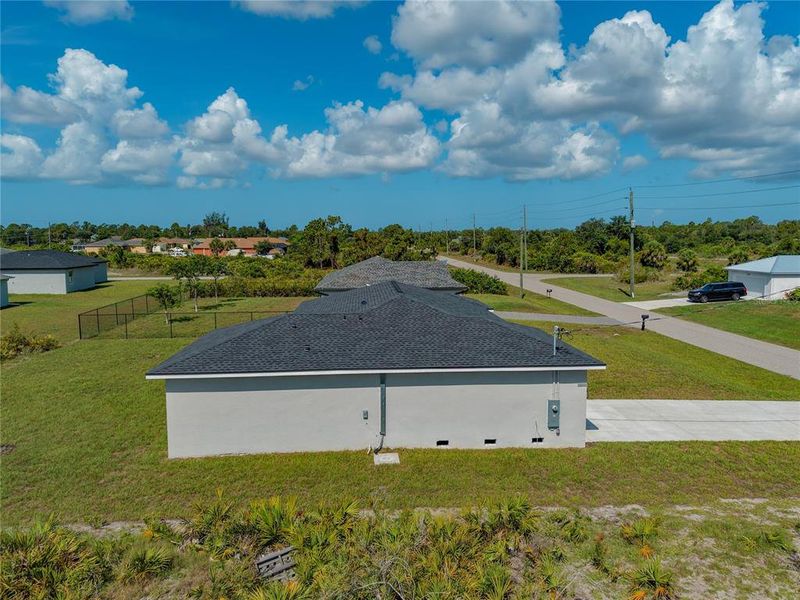 Front exterior of a new home in , Port Charlotte, FL, highlighting curb appeal (Image 14). Front exterior of a new home in , Port Charlotte, FL, highlighting curb appeal (Image 14).