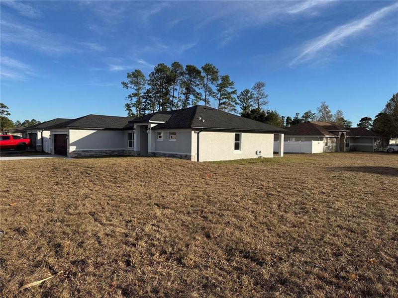 Exterior details and patio area of a home in , Deltona (Image 23).