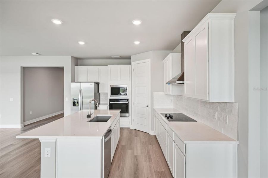 Furnished interior view inside a new home in Crescent Lakes - Signature Series, Punta Gorda (Image 8).