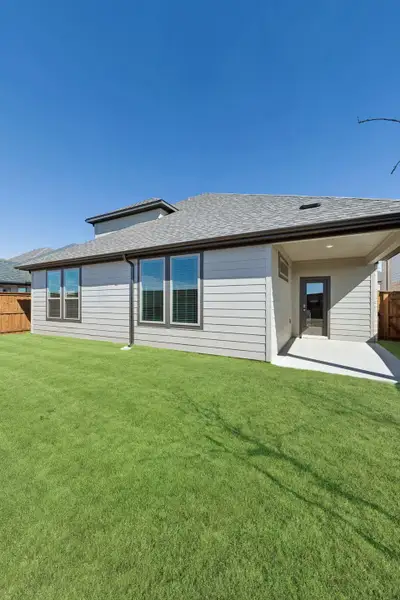 Covered Patio in the Wimbledon home plan by Trophy Signature Homes – REPRESENTATIVE PHOTO