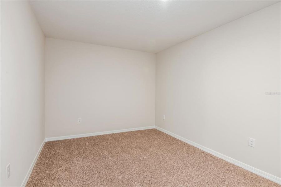 Spacious, unfurnished interior of a new home in Grove at Crosswind, Haines City (Image 23).