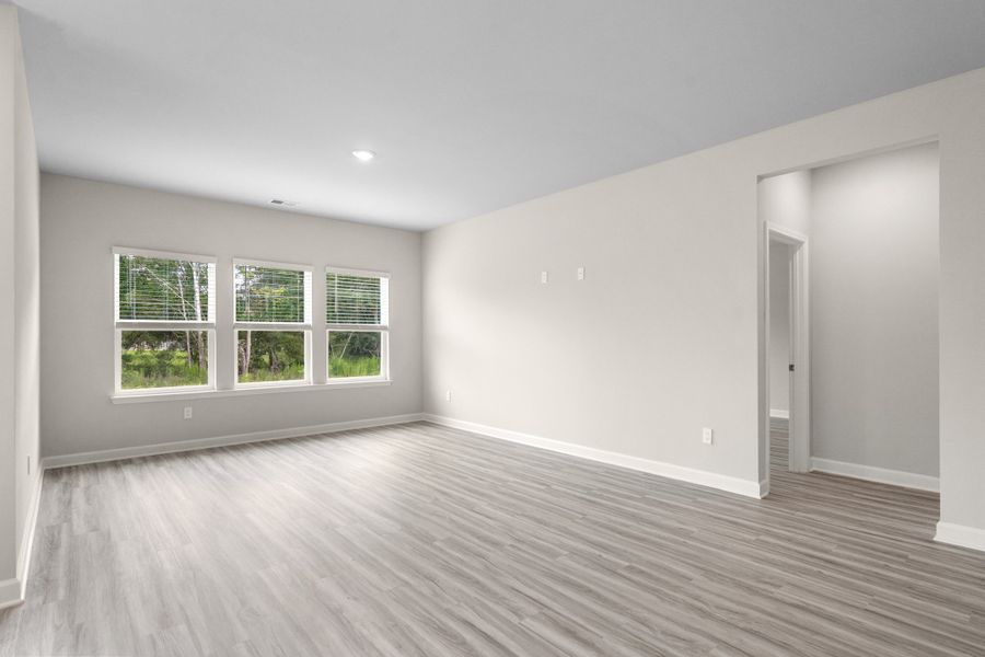 Spacious, unfurnished interior of a new home in Cypress Ridge - The Coastline Series, Longs (Image 17).