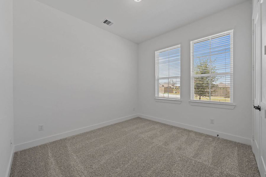 Representative unfurnished interior of a home built from the Augusta by Chesmar Homes in Riceland Alley Loads, Mont Belvieu (Image 26).