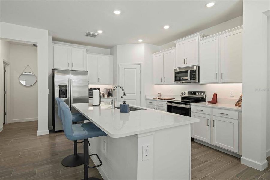 Furnished interior view inside a new home in Angeline Active Adult, Land O' Lakes (Image 5). Furnished interior view inside a new home in Angeline Active Adult, Land O' Lakes (Image 5).