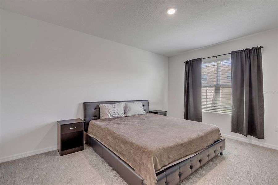 Furnished interior view inside a new home in Groveside at Ormond Station, Ormond Beach (Image 46).