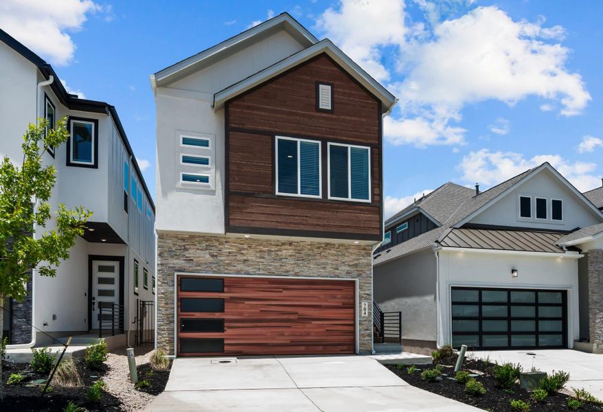 Front exterior of a new home in Centero at Stone Oak, San Antonio, TX, highlighting curb appeal (Image 19).