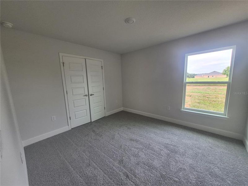 Spacious, unfurnished interior of a new home in Hill Country Estates, Dade City (Image 27).