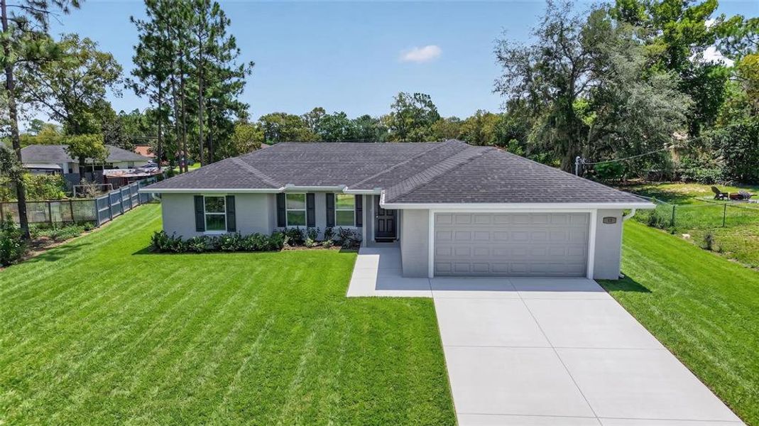 Front exterior of a new home in , Ocala, FL, highlighting curb appeal (Image 20).