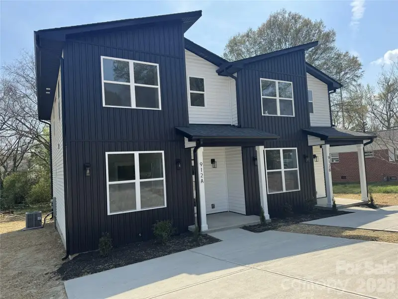 Front exterior of a new home in , Kannapolis, NC, highlighting curb appeal (Image 11).