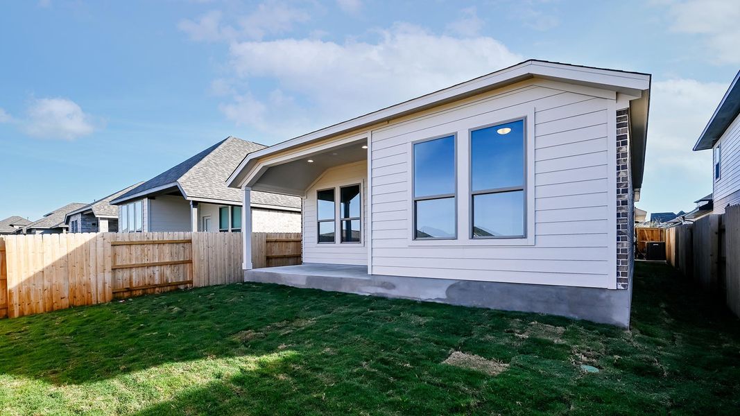 Exterior details and patio area of a home in Crosswinds, Kyle (Image 24).