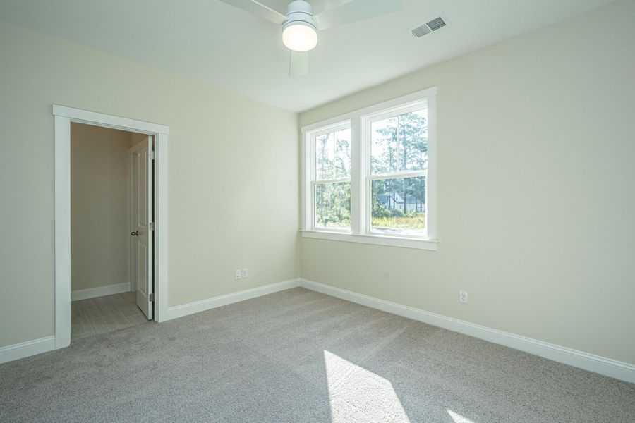 Spacious, unfurnished interior of a new home in , Awendaw (Image 11).