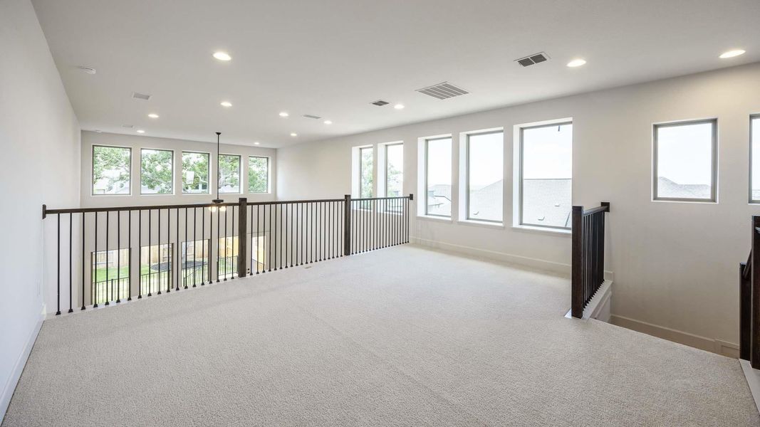 Spacious, unfurnished interior of a new home in Parkside on the River West, Georgetown (Image 11).
