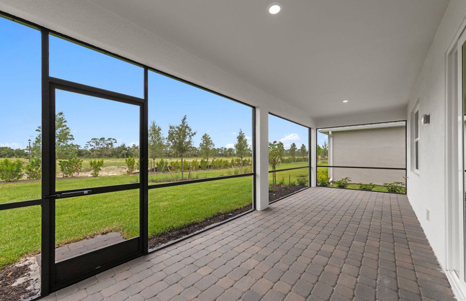 Exterior details and patio area of a home in Del Webb Oak Creek, North Fort Myers (Image 19).