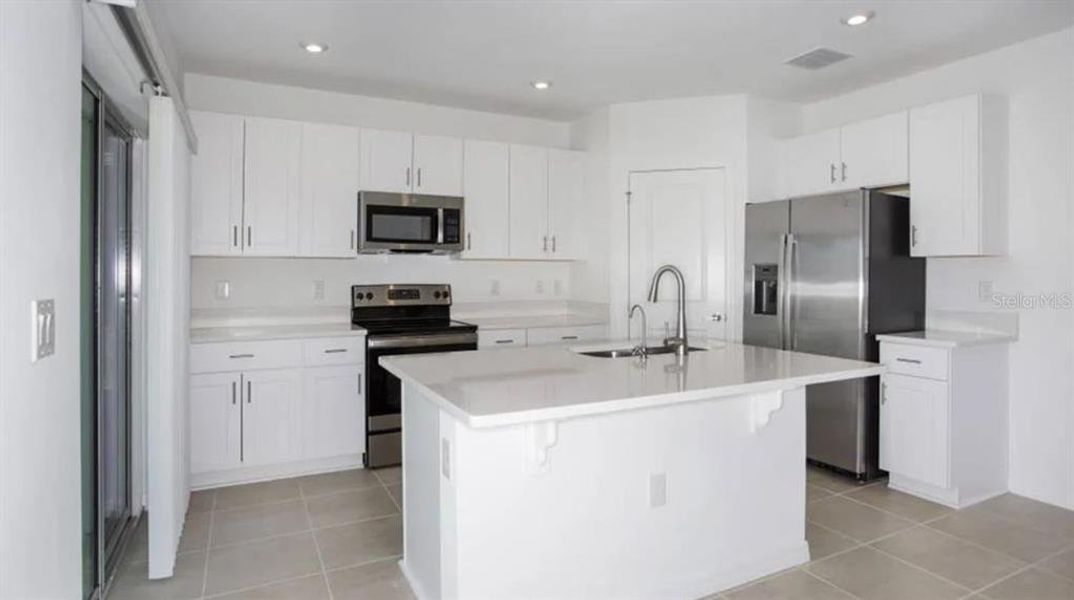 Furnished interior view inside a new home in Firethorn, Parrish (Image 4).