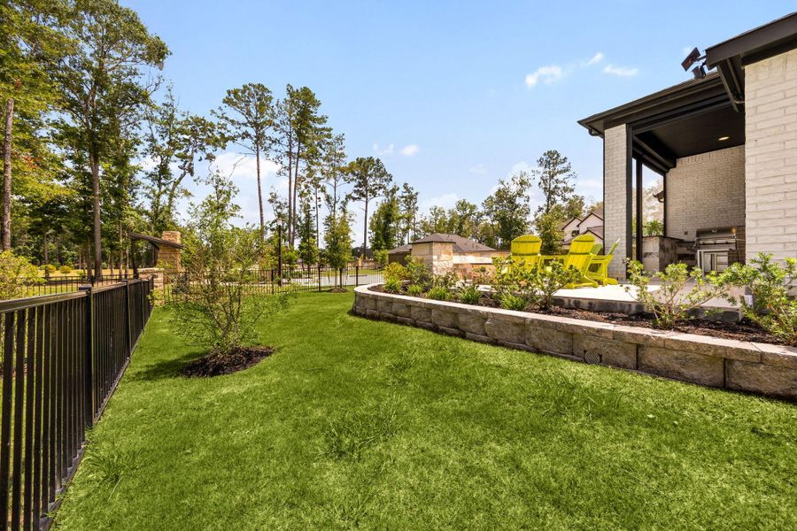 Exterior details and patio area of a home in The Highlands, Porter (Image 34).