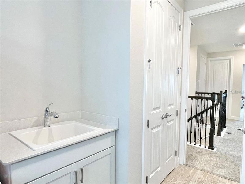 Furnished interior view inside a new home in Parkview Reserve, Orlando (Image 56).