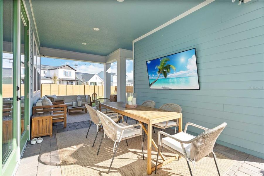 Exterior details and patio area of a home in Weslyn Park at Sunbridge (Craft Homes), St. Cloud (Image 25).