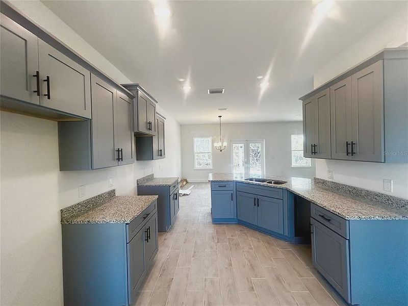 Furnished interior view inside a new home in Deep Creek, Punta Gorda (Image 6).