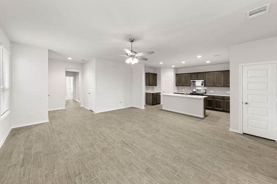 Representative exterior photo of a completed home built from the Hickory by Impression Homes in Northspur, Terrell, TX (Image 11). Representative exterior photo of a completed home built from the Hickory by Impression Homes in Northspur, Terrell, TX (Image 11).